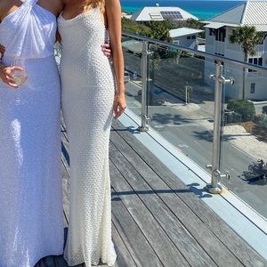 The best dress ever! Completely embellished in pearls, open back, cowl neck.